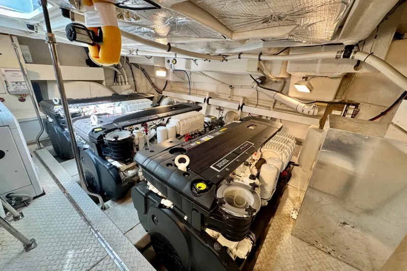  Yacht Photos Pics Engine room of 2012 Cruisers Yachts 540 Sports Coupe, featuring dual powerful engines.