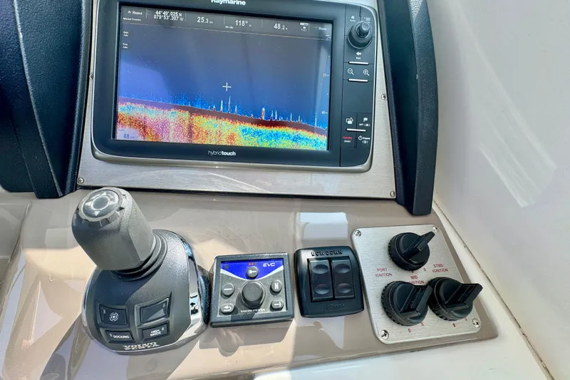  Yacht Photos Pics Control panel of 2012 Cruisers Yachts 540 Sports Coupe with navigation display.