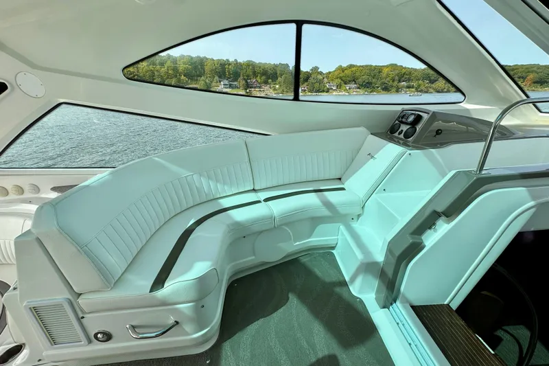  Yacht Photos Pics Luxurious interior of 2012 Cruisers Yachts 540 Sports Coupe with scenic lake view.