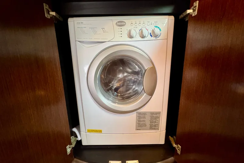  Yacht Photos Pics Washing machine inside 2012 Cruisers Yachts 540 Sports Coupe wooden cabinet.