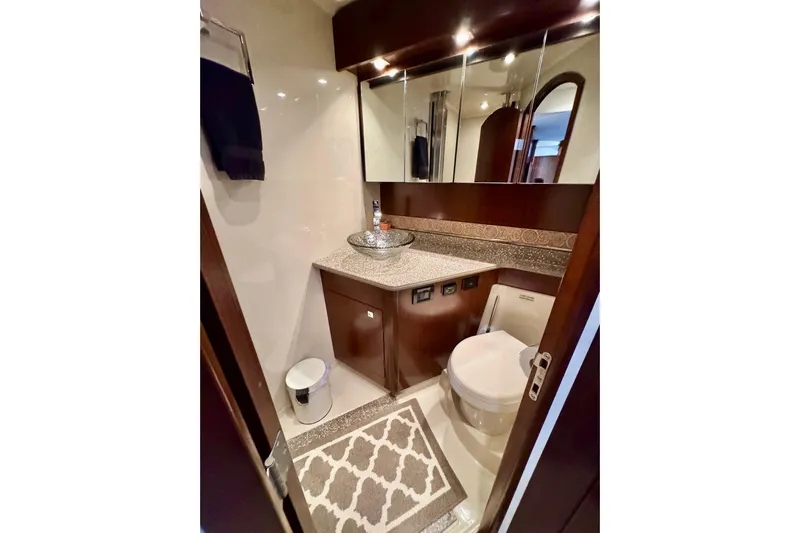  Yacht Photos Pics Luxurious bathroom in 2012 Cruisers Yachts 540 Sports Coupe with elegant fixtures and decor.