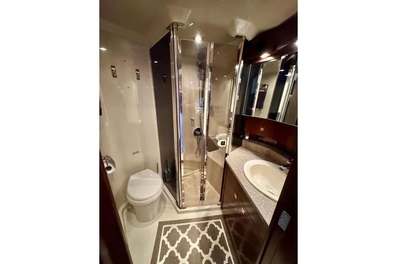  Yacht Photos Pics Luxurious bathroom in 2012 Cruisers Yachts 540 Sports Coupe with shower and modern fixtures.