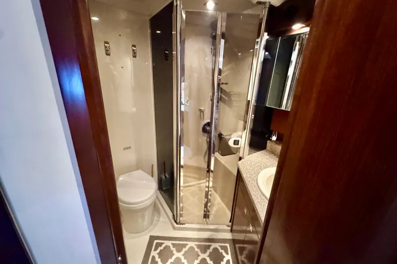  Yacht Photos Pics Luxurious bathroom in 2012 Cruisers Yachts 540 Sports Coupe with modern amenities.