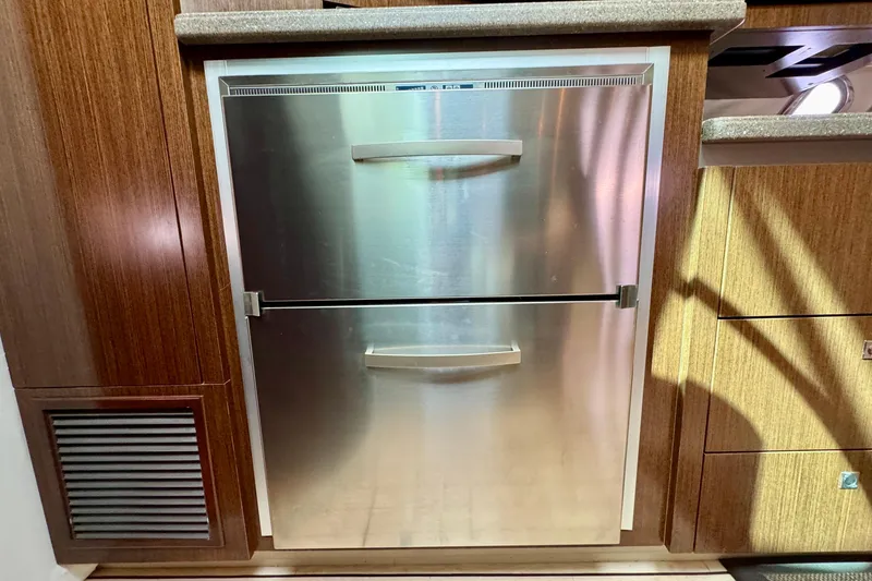  Yacht Photos Pics Stainless steel refrigerator in 2012 Cruisers Yachts 540 Sports Coupe kitchen.