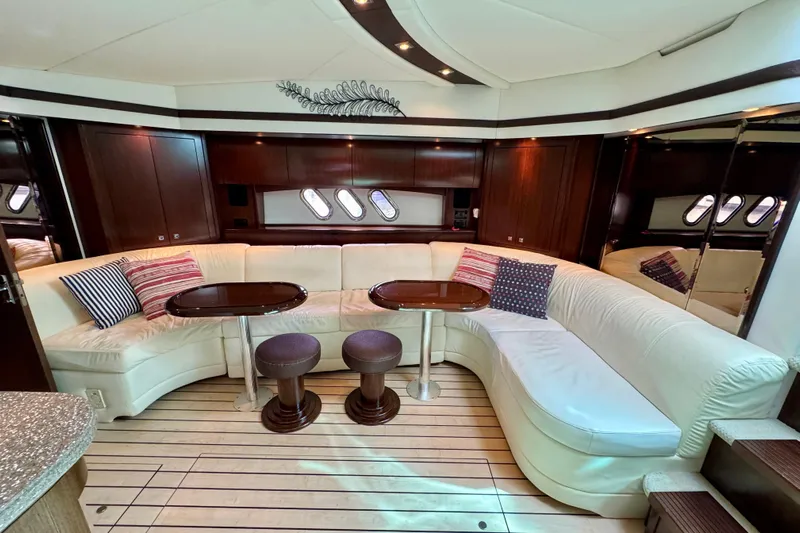  Yacht Photos Pics Luxurious interior of 2012 Cruisers Yachts 540 Sports Coupe with elegant seating and decor.