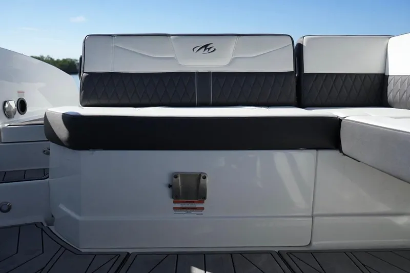  Yacht Photos Pics 2023 Monterey 305SS Super Sport boat seating with sleek black and white upholstery.