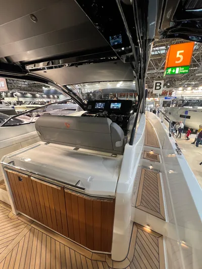  Yacht Photos Pics 2025 FIM 440 Regina yacht interior at a boat show, showcasing sleek design and modern amenities.