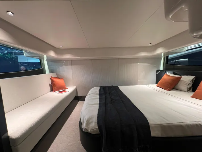  Yacht Photos Pics Luxurious interior of 2025 FIM 440 Regina yacht with bed and seating area.