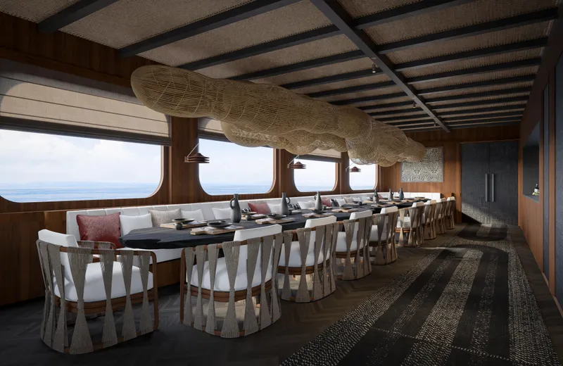 Jiva Ananta Yacht Photos Pics Luxurious dining area on 2027 Phinisi Custom yacht with elegant seating and ocean views.