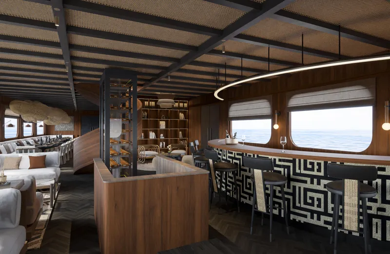 Jiva Ananta Yacht Photos Pics Luxurious interior of 2027 Phinisi Custom yacht with elegant bar and seating area.