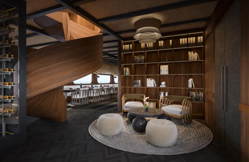 Jiva Ananta Yacht Photos Pics Luxurious Phinisi Custom 2027 yacht interior with elegant wooden staircase and cozy seating area.