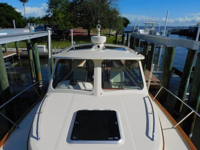  Yacht Photos Pics 2013 Hinckley T34 boat docked at marina, front view.