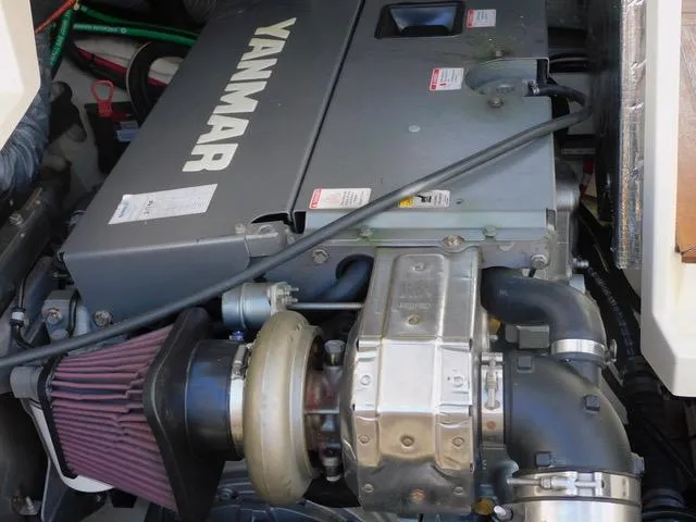  Yacht Photos Pics Yanmar engine in a 2013 Hinckley T34 boat, showcasing mechanical components.