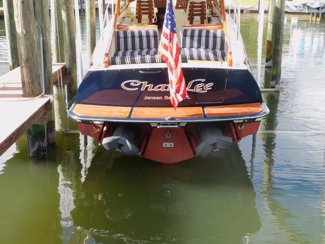  Yacht Photos Pics Hinckley T34 boat, 2013 model, docked with American flag, rear view.