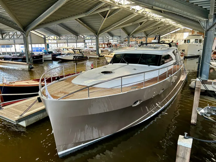  Yacht Photos Pics Luxury Van der Heijden Exclusive de Luxe 1600 yacht docked in a marina, 2021 model.