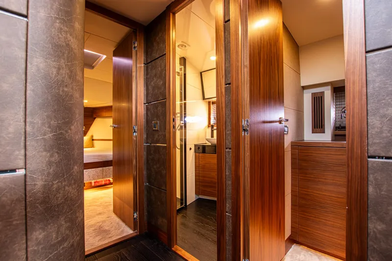  Yacht Photos Pics Luxurious interior of 2021 Van der Heijden Exclusive de Luxe 1600 yacht, featuring wood finishes.