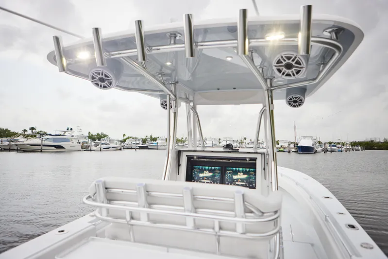  Yacht Photos Pics 2026 Contender 32 ST boat with advanced navigation system at marina.