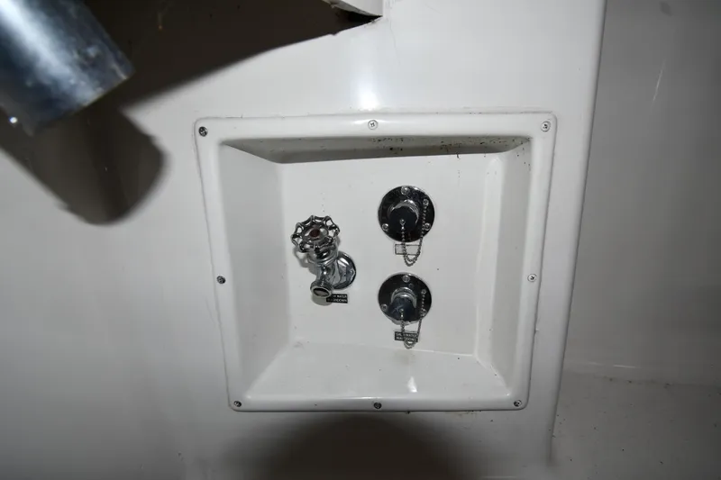 Your Rent's Due Yacht Photos Pics Control panel on a 1996 Viking 50 Convertible boat, featuring knobs and switches.