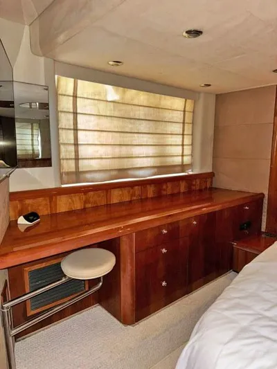  Yacht Photos Pics Luxurious interior of 2008 Sunseeker Predator 62 yacht with elegant wood finish.