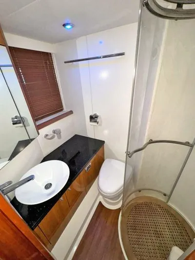  Yacht Photos Pics Luxurious bathroom in 2008 Sunseeker Predator 62 yacht with modern fixtures.