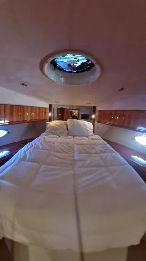  Yacht Photos Pics Luxurious bedroom interior of 2008 Sunseeker Predator 62 yacht.