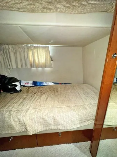  Yacht Photos Pics Interior cabin of 2008 Sunseeker Predator 62 yacht with cozy bunk bed.