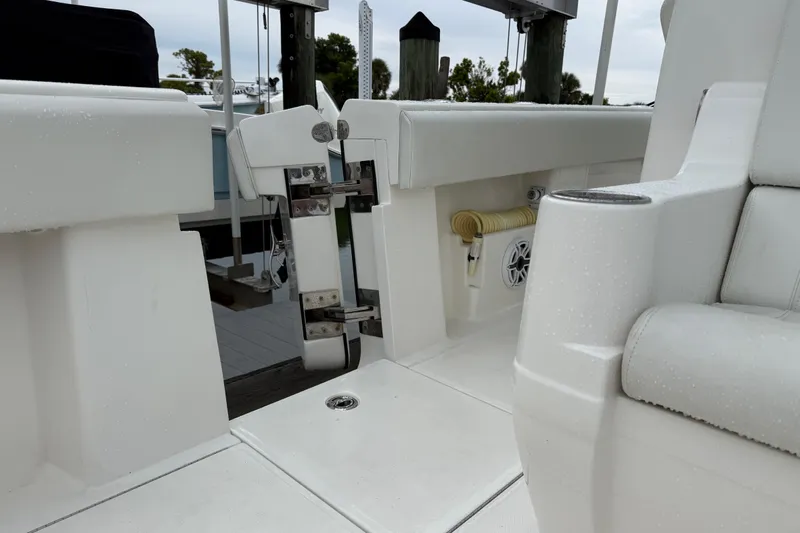  Yacht Photos Pics 2022 SeaVee 270Z boat interior with seating and deck details.