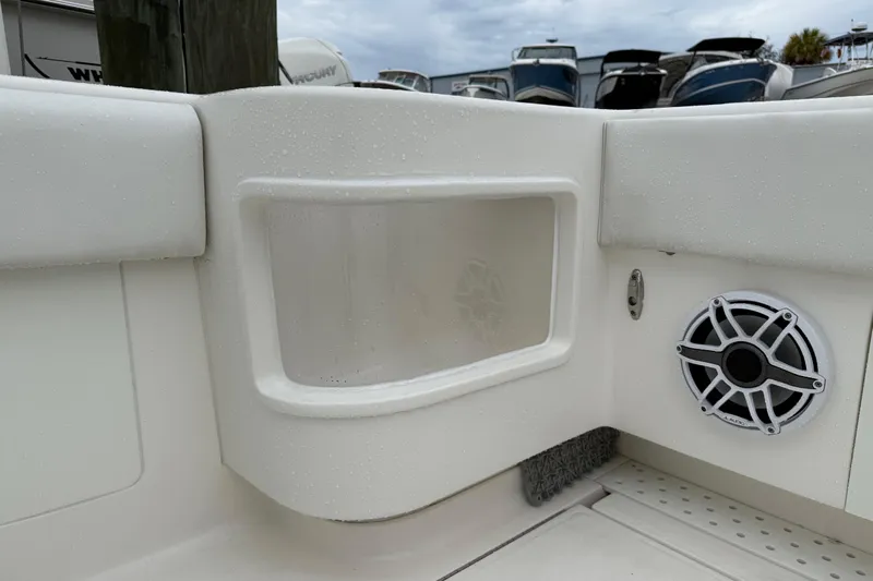  Yacht Photos Pics 2022 SeaVee 270Z boat interior with speaker and storage compartment.
