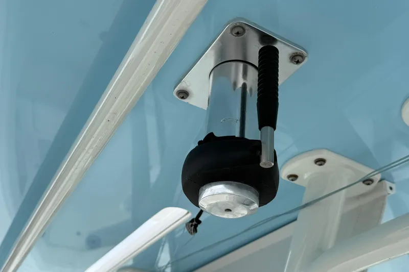  Yacht Photos Pics 2022 SeaVee 270Z boat detail showing a mounted rod holder on a blue surface.