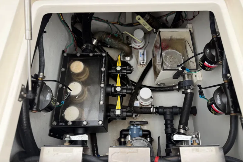  Yacht Photos Pics 2022 SeaVee 270Z boat engine compartment with visible wiring and components.