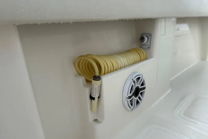  Yacht Photos Pics 2022 SeaVee 270Z boat detail with coiled hose and speaker.
