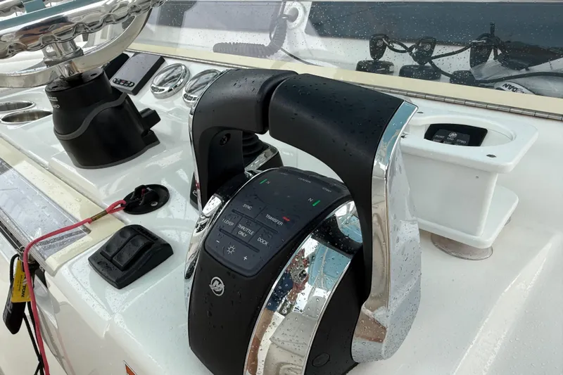  Yacht Photos Pics 2022 SeaVee 270Z boat helm with modern controls and steering wheel.