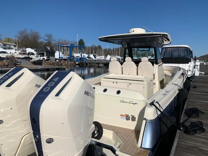  Yacht Photos Pics 2024 Chris-Craft Catalina 34 boat docked, featuring dual Mercury engines.