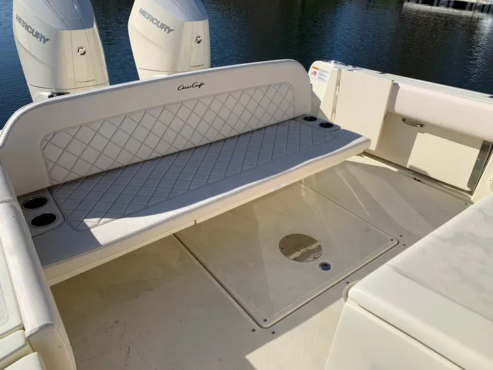  Yacht Photos Pics 2024 Chris-Craft Catalina 34 boat with cushioned seating and dual Mercury engines.