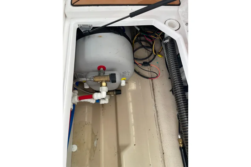  Yacht Photos Pics 2019 Ranger Tugs R-27 boat interior showing plumbing and wiring components.