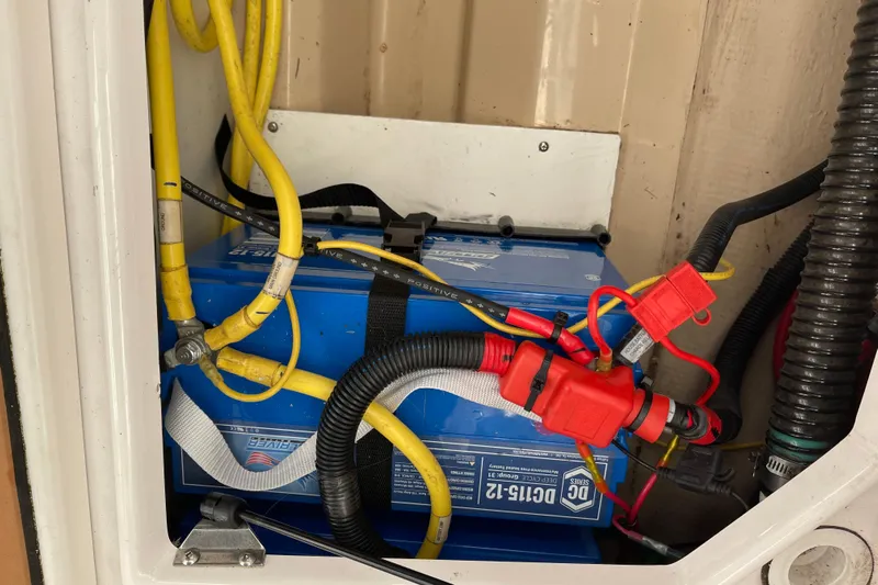  Yacht Photos Pics Battery compartment of 2019 Ranger Tugs R-27 with connected cables and wiring.