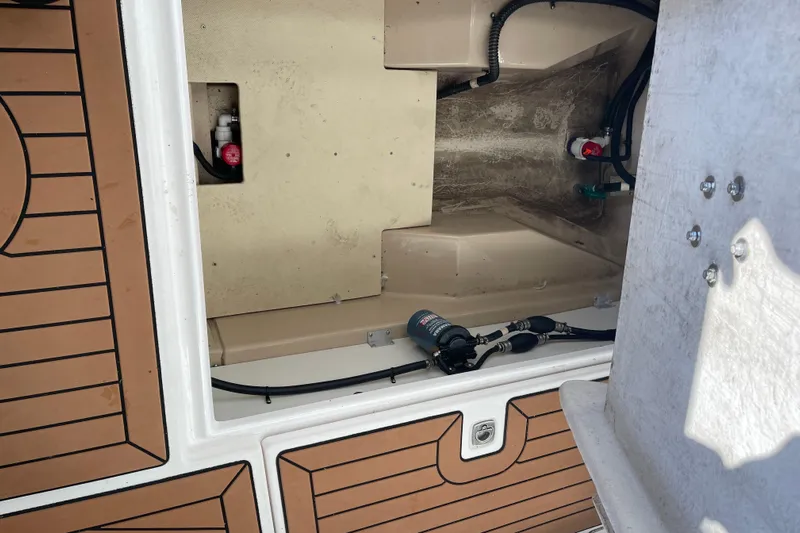  Yacht Photos Pics 2019 Ranger Tugs R-27 boat interior showing storage compartment and mechanical components.