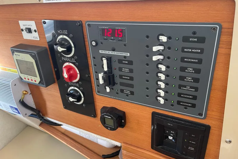  Yacht Photos Pics Control panel of a 2019 Ranger Tugs R-27 boat with switches and meters.
