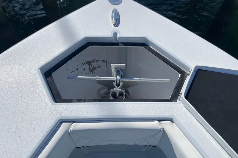  Yacht Photos Pics Bow anchor compartment of 2022 Conch 33 boat, featuring a sleek design.