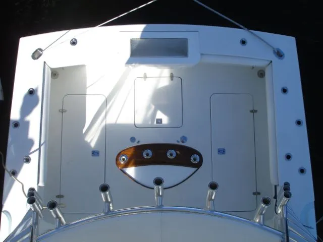 Bait's Factor Yacht Photos Pics Stolper 35 EXPRESS 2002 boat deck with rod holders and storage compartments.