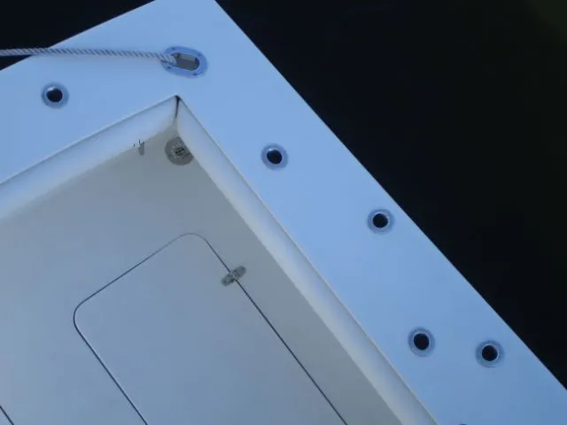 Bait's Factor Yacht Photos Pics Stolper 35 EXPRESS 2002 boat deck with rope and hatch, viewed from above.