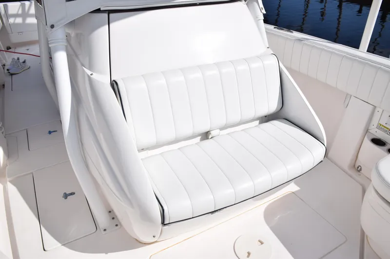  Yacht Photos Pics 2017 Intrepid 327 boat with white cushioned seating.