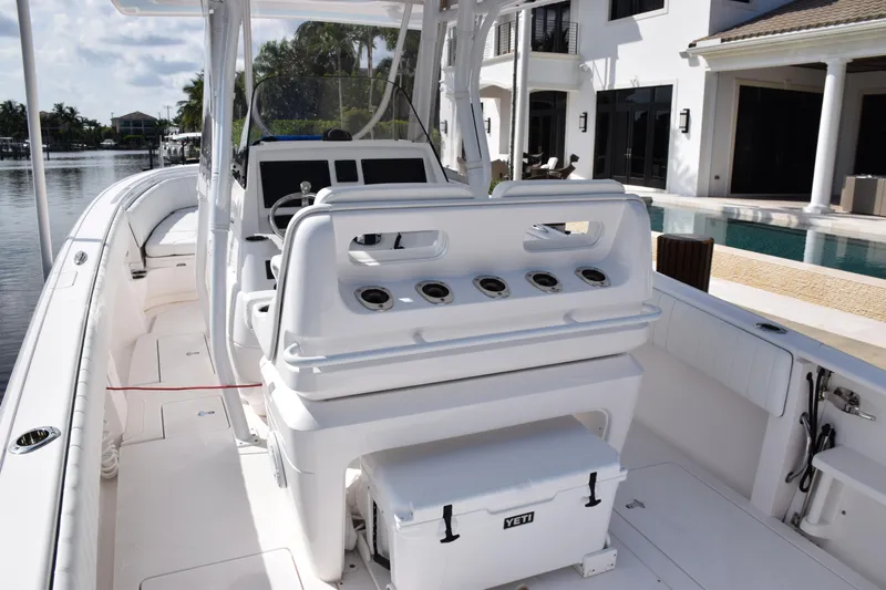  Yacht Photos Pics 2017 Intrepid 327 boat interior with seating and Yeti cooler.
