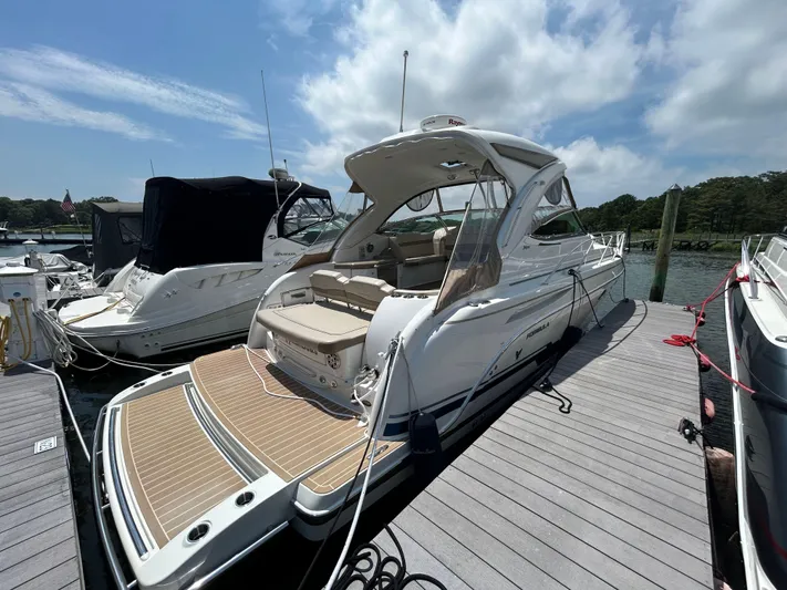  Yacht Photos Pics 2021 Formula 34 Performance Cruiser docked at marina under blue sky.