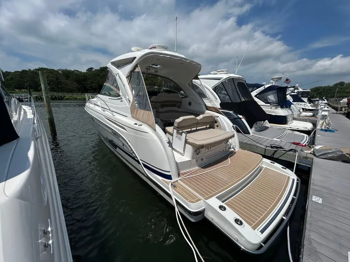  Yacht Photos Pics 2021 Formula 34 Performance Cruiser docked at marina under blue sky.