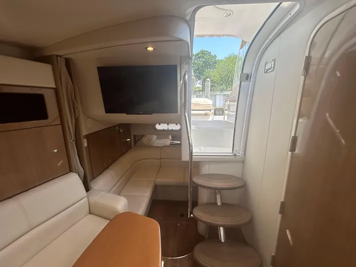  Yacht Photos Pics Interior of 2021 Formula 34 Performance Cruiser with modern seating and TV.