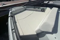2023 Saxdor 270 GTO boat with spacious sunbathing deck in marina.