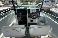2023 Saxdor 270 GTO boat interior with dual seats and modern dashboard.