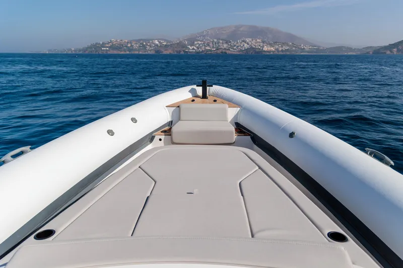 Rock Marine Rm 40 Yacht Photos Pics 2026 Rock Marine RM 40 boat cruising on open sea with scenic coastal view.