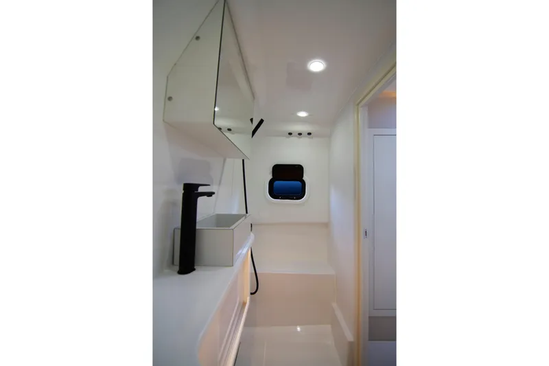 Rock Marine Rm 40 Yacht Photos Pics Modern bathroom interior of 2026 Rock Marine RM 40 yacht, featuring sleek design and lighting.